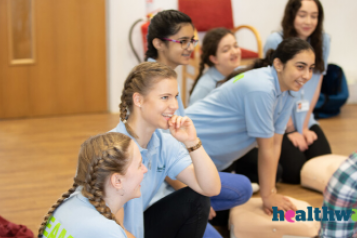 Young people at a first aid event